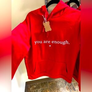 Super soft hooded sweatshirt.  Positive message on front ‘You are enough’